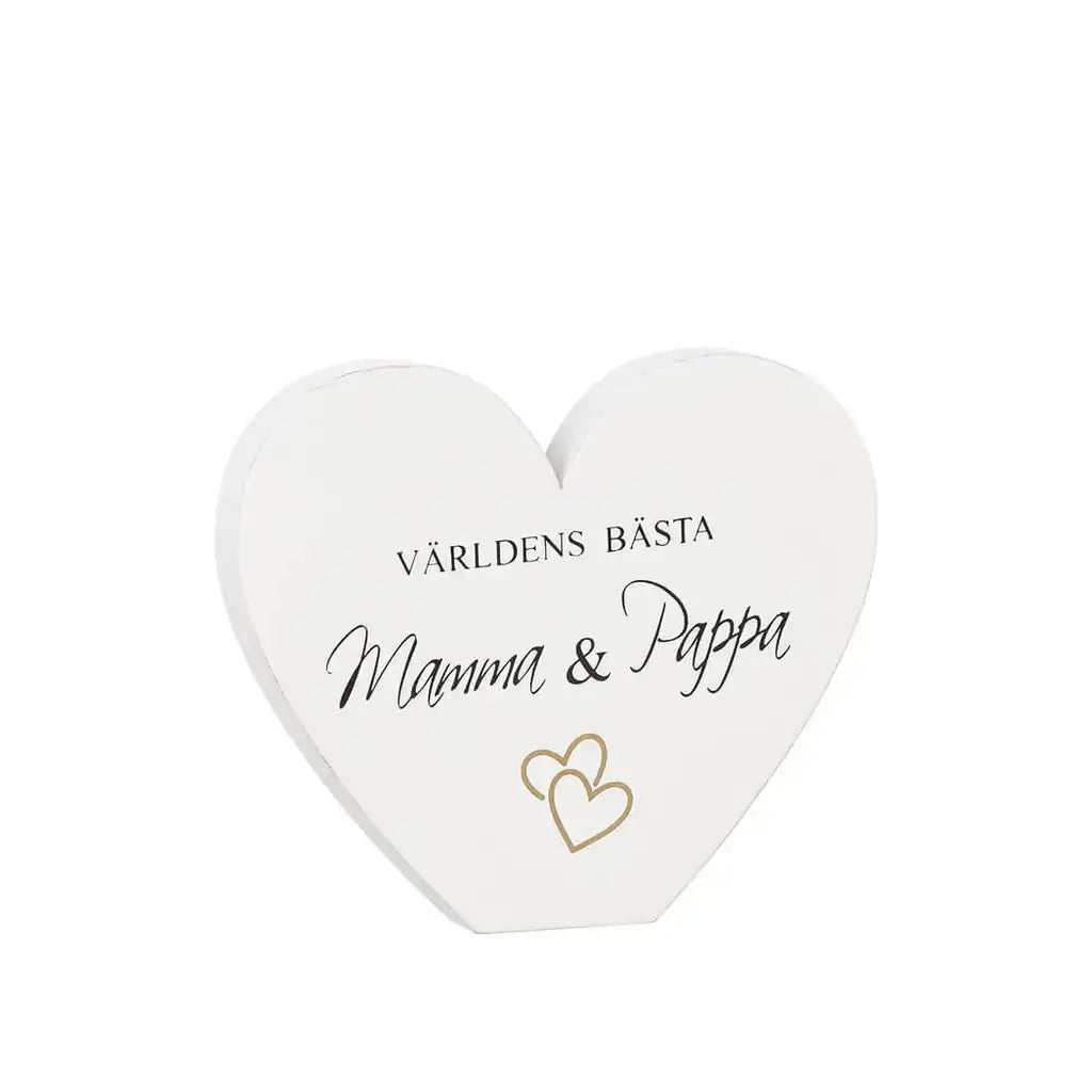 En vit hjärtformad plakett med texten Världens bästa Mamma & Pappa och två guldkonturerade hjärtan under, mot en vit bakgrund.