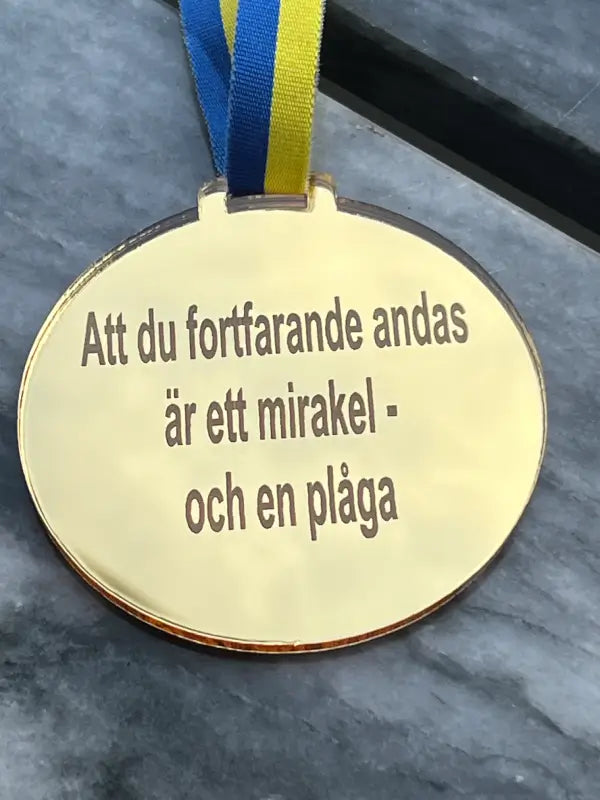 Medalj | Rolig