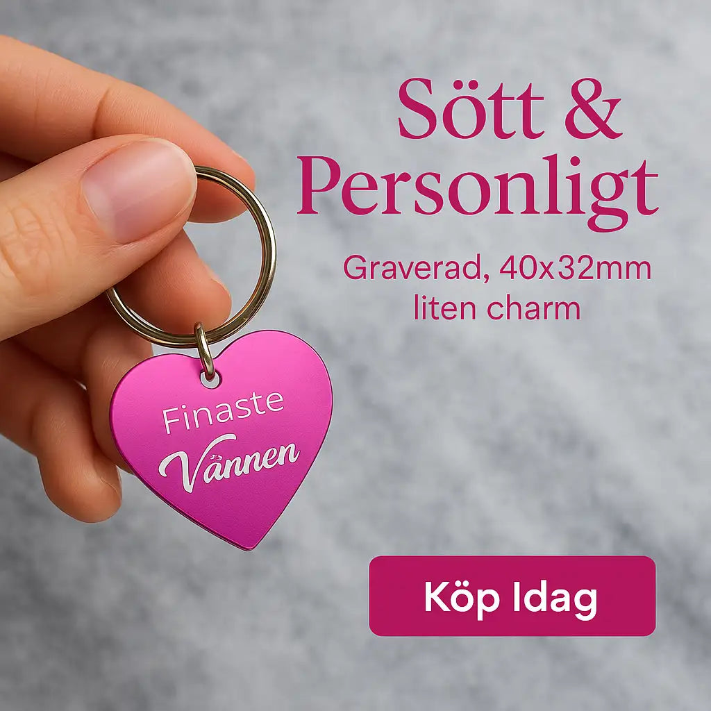En hand håller i en rosa Nyckelring | Finaste vännen från Express-presenter, graverad med "Finaste vännen" på en 40x32mm charm. Knapp: Köp Idag.