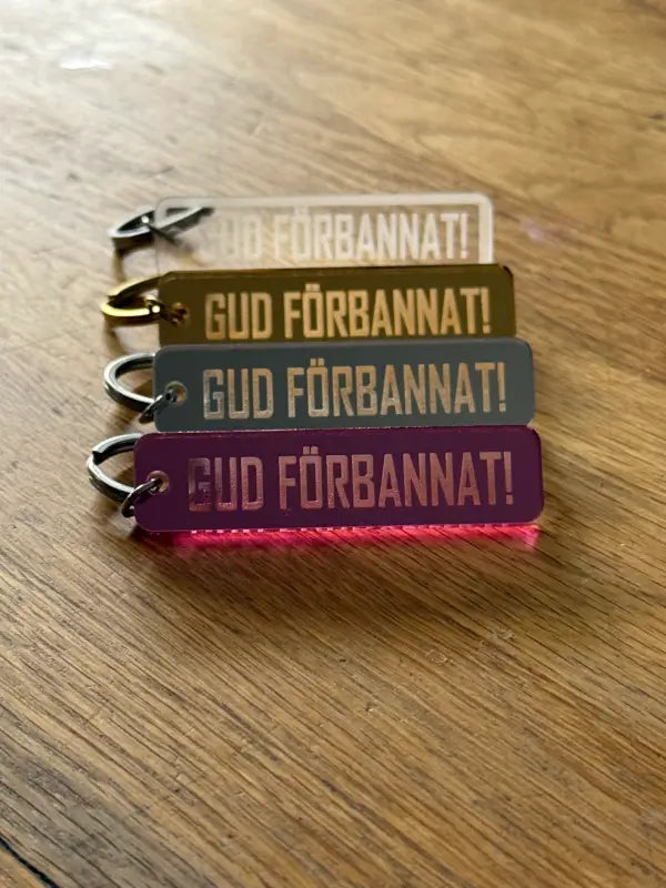 Nyckelring | “Gud förbannat” i spegelplast - Expresspresenter.se