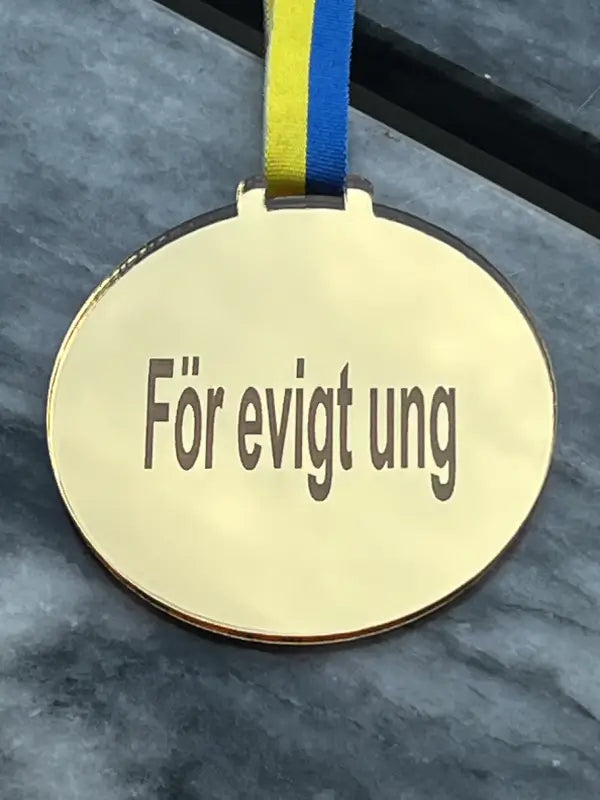 Medalj | För evigt ung