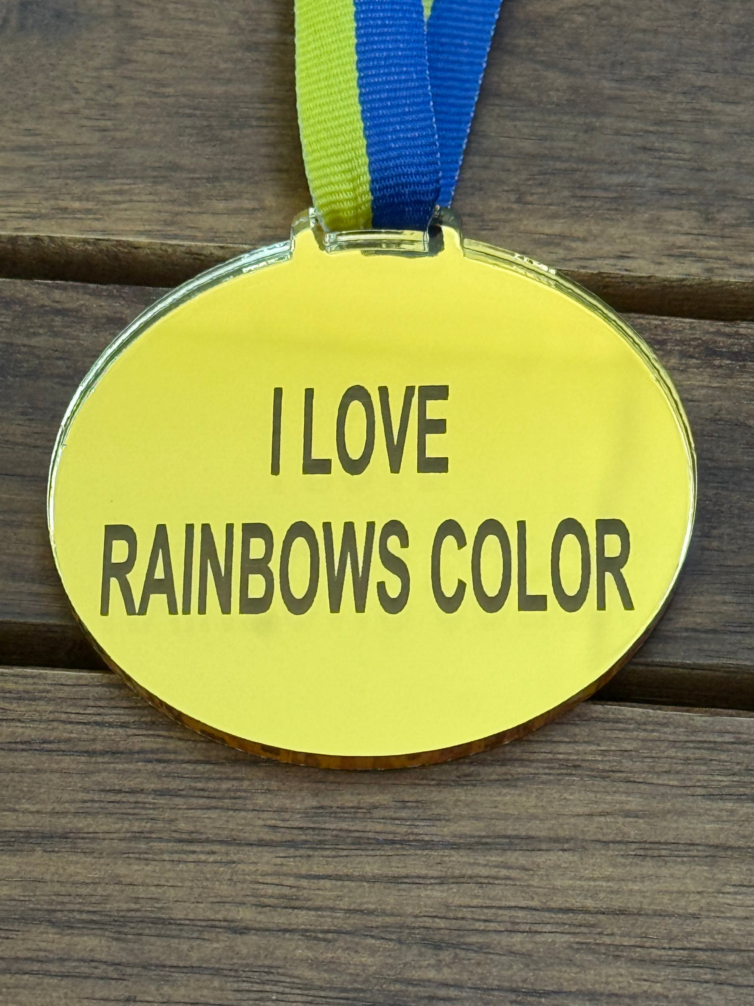 guldfärgad medalj, text i love rainbows color