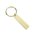 "Rostfri nyckelring i silverfärg med personlig text – perfekt present" - Express-presenter