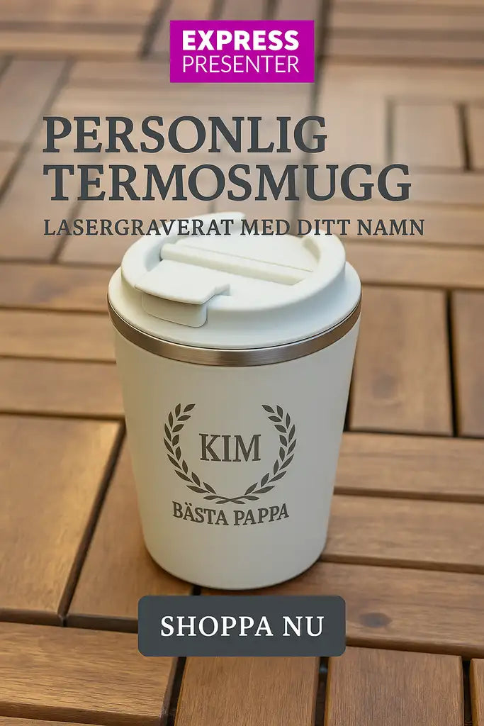 En vit Termosmugg | Bästa pappa från Express-presenter i rostfritt stål står på ett trägolv med graverad text. Ovanför finns svensk information om personliga muggar och lasergravyr. Nedan syns en knapp: SHOPPA NU.