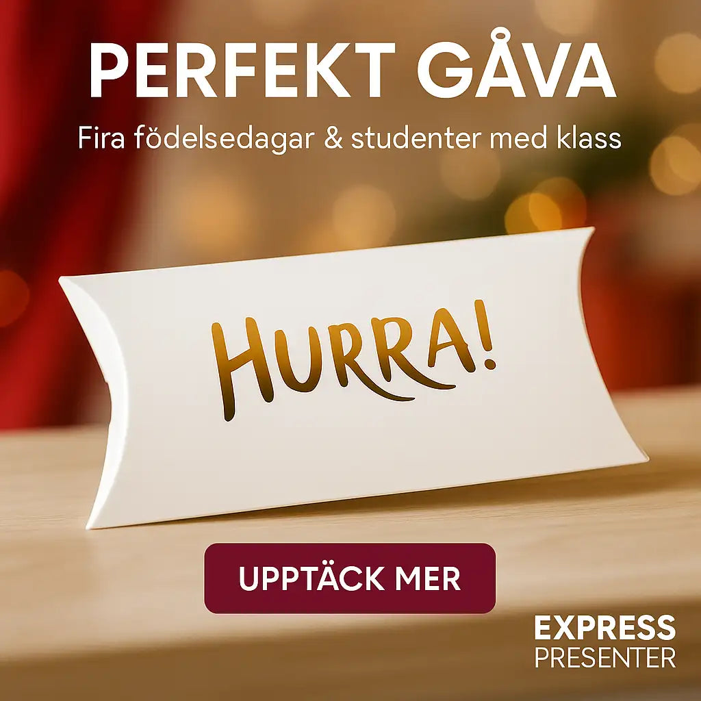 En vit Presentförpackning | Hurra från Express-presenter med "Hurra!" i guld står på ett bord. Ovanför står det "Perfekt gåva" och "Fira födelsedagar & studenter med klass". Nedanför finns en knapp: "Upptäck mer.