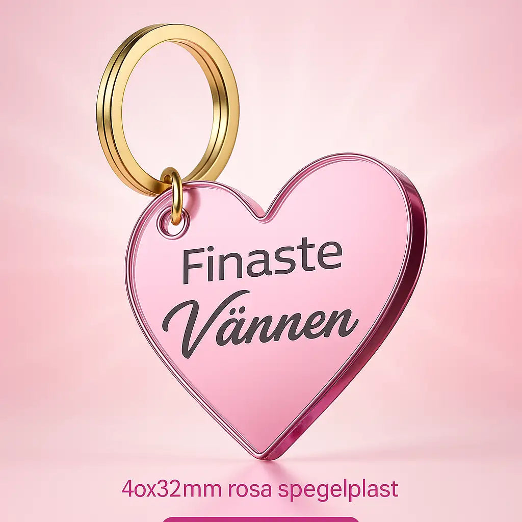 Nyckelring | Finaste vännen Rosa från Express-presenter: hjärtformad rosa spegelplast med texten "Finaste Vännen" och guldfärgad ring. Perfekt present till en vän. Storlek: 4x32 mm.