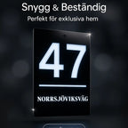 Fasadskylt exklusiv från Express-presenter är en snygg blanksvart akrylskylt som visar 47 och NORRSJÖVIKSVÄG, med "Snygg & Beständig" och "Perfekt för exklusiva hem" på svenska - perfekt som en snygg husnummerskylt för moderna hem.