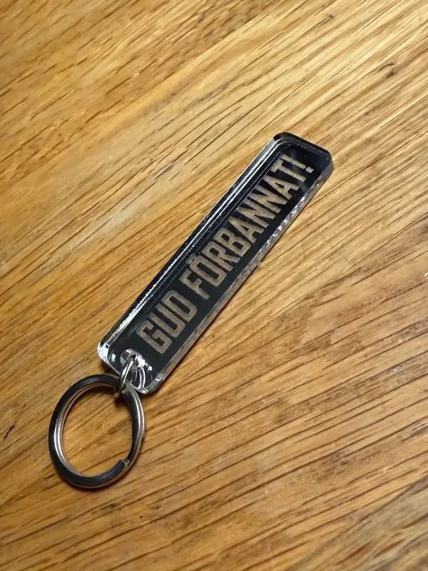 Nyckelring | Gud förbannat i spegelplast - Express - presenter